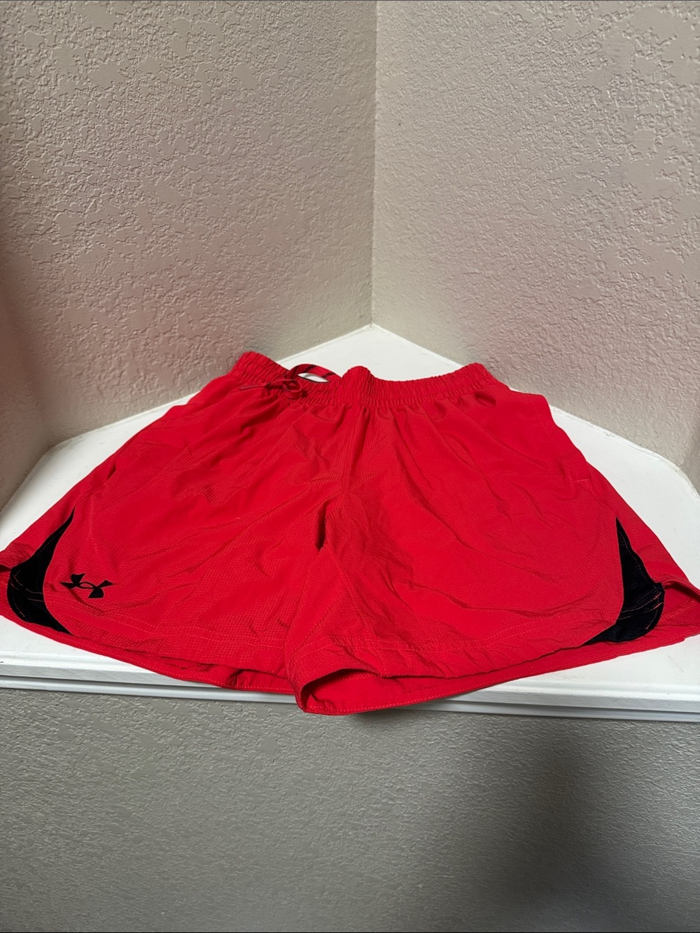 Under Armour Boys Red Athletic Shorts with Black Accents